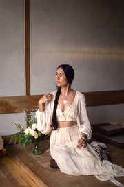 Versatile Organic Cotton, Bamboo, and Linen Blend Garment with Braided Detail and Airy Sleeves, Perfect for Relaxed Elegance.